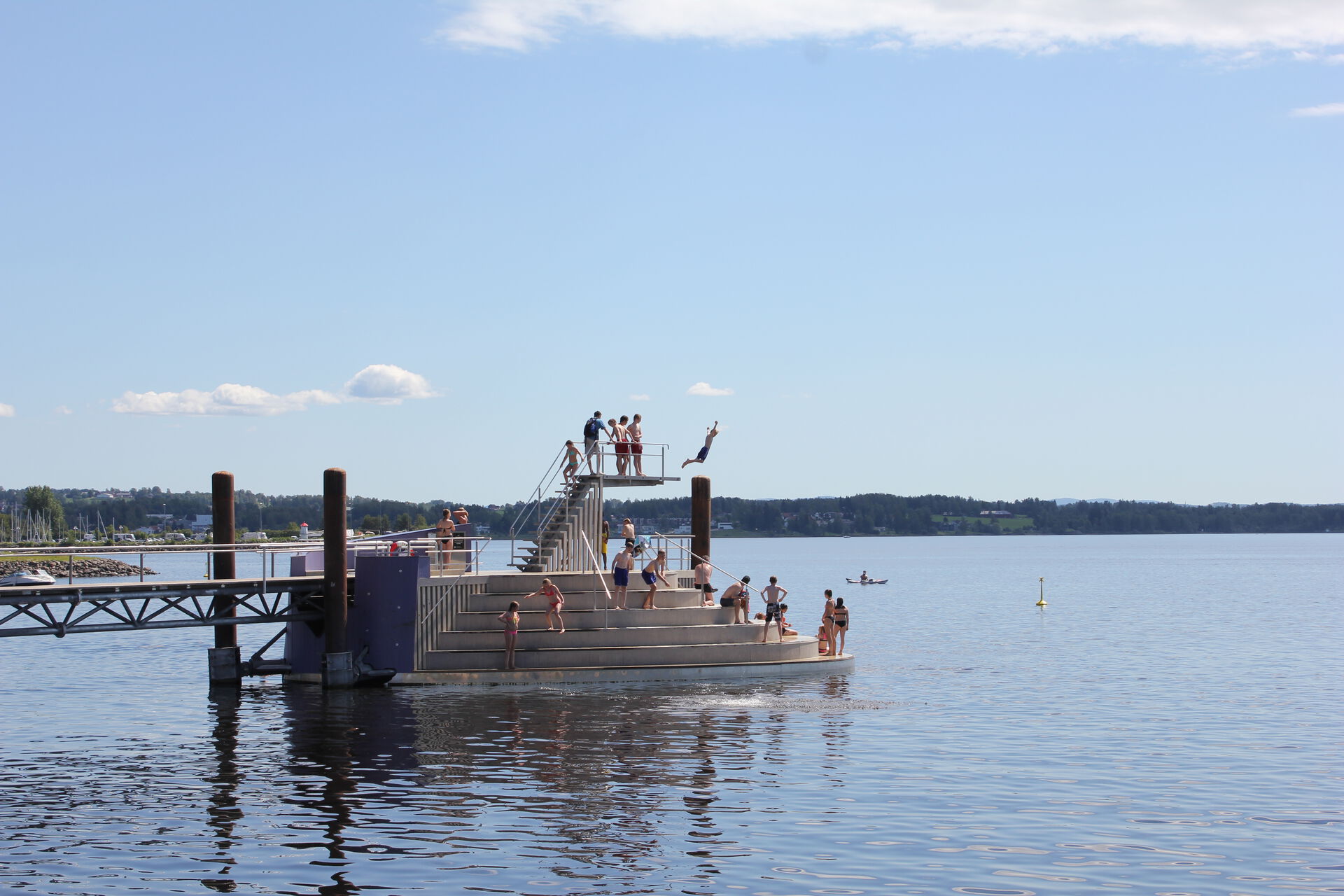 People on a diving platform in lake Mjøsa.